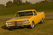 AUT 22 RK2306 01
1965 Chevrolet, El Camino, Yellow 3/4 Front View On Grass