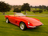 AUT 22 RK2350 02
1968 Intermeccanica Italia Convertible Red 3/4 Front View On Grass