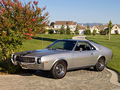 AUT 22 RK2358 01
1968 AMC AMX Silver 3/4 Front View On Pavement By Grass And Trees