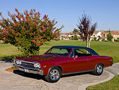 AUT 22 RK2364 01
1967 Chevrolet Chevelle SS 396 Maroon 3/4 Side View On Pavement By Grass And Trees