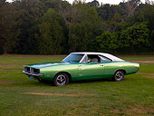 AUT 22 RK2387 01
1969 Dodge Charger R/T Green 3/4 Side View On Grass Trees