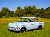 AUT 22 RK2392 01
1965 Volkswagen Type 3 Notchback Bahama Blue 3/4 Side View On Grass Trees Background