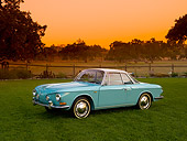 AUT 22 RK2397 01
1964 Volkswagen Karmann Ghia Type 3 Pacific Blue  Side 3/4 View On Grass