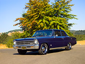 AUT 22 RK2404 01
1967 Chevrolet Nova Chevy II Blue Low 3/4 Front View On Pavement By Trees