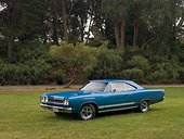 AUT 22 RK2415 01
1968 Plymouth GTX Blue 3/4 Side View On Grass Trees Background