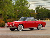 AUT 22 RK2451 01
1963 Volkswagen Type 34 Karmann Ghia Red Black Top Low 3/4 Front View On Pavement