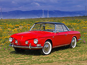 AUT 22 RK2457 01
1963 Volkswagen Karmann Ghia Type 343 Red Black Top 3/4 Front View In Field