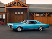 AUT 22 RK2505 01
1967 Pontiac GTO Turquoise Green 3/4 Side View On Pavement