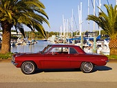 AUT 22 RK2524 01
1962 Pontiac Tempest LeMans Burgundy 3/4 Front View On Pavement By Harbor