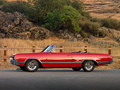 AUT 22 RK2540 01
1965 Oldsmobile 442 Convertible Red Profile View On Pavement
