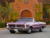 AUT 22 RK2615 01
1965 Pontiac GTO Convertible Lavender Front 3/4 View On Pavement By Building Tree Ivy