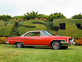 AUT 22 RK2619 01
1962 Chrysler 300H Red Front 3/4 View On Grass By Shrubs Sky