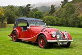 AUT 22 RK2699 01
1966 Morgan Plus 4 Super Sports Convertible Red 3/4 Front View On Lawn