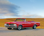 AUT 22 RK2751 01
1964 Pontiac GTO Convertible Red 3/4 Front View On Pavement By Hills