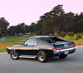 AUT 22 RK2768 01
1968 AMC AMX Black 3/4 Rear View On Pavement