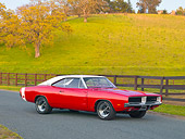 AUT 22 RK2797 01
1969 Dodge Charger R/T Red And White 3/4 Front View On Pavement By Hills
