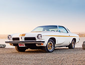 AUT 23 BK0037 01
1973 Oldsmobile Cutlass White And Gold Stripe 3/4 Front View On Gravel By Lake