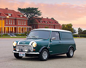 AUT 23 BK0060 01
1978 Austin Mini Van Green 3/4 Front View On Pavement By Brick Buildings