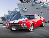AUT 23 BK0073 01
1970 Chevrolet Chevelle SS 454 Red With White Stripe 3/4 Front View On Pavement By Shipyard