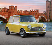 AUT 23 BK0078 01
1972 Mini Innocenti Minor MK3 Light Green 3/4 Front View On Pavement By Bridge