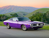 AUT 23 BK0079 01
1971 Dodge Charger 440 Magnum R/T Purple 3/4 Front View On Pavement By Grassy Hills