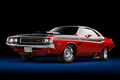 AUT 23 BK0102 01
1970 Dodge Challenger T/A Red And Black 3/4 Front View In Studio