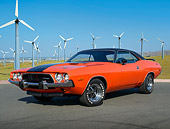 AUT 23 BK0113 01
1973 Dodge Challenger Hemi Orange 3/4 Front View On Pavement By Windmills