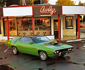 AUT 23 RK0080 01
1971 Plymouth Roadrunner Green 3/4 Front View On Pavement By Diner