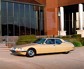 AUT 23 RK0341 02
1972 Citroen Maserati SM Tan 3/4 Side View On Pavement By Museum