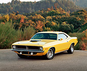 AUT 23 RK0374 04
1970 Plymouth Hemicuda Yellow 3/4 Front View On Pavement By Bushes