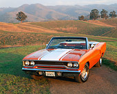 AUT 23 RK0392 04
1970 Plymouth Road Runner Convertible Orange And White 3/4 Front View On Grass