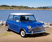 AUT 23 RK0487 04
1972 Austin Mini Cooper Blue White Top 3/4 Front View On Dirt By Water