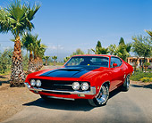 AUT 23 RK0534 02
1970 Ford Torino Red And Black 3/4 Front View On Pavement By Palm Trees