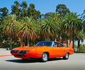 AUT 23 RK0613 02
1970 Plymouth Superbird Orange Low 3/4 Front View On Pavement By Palm Trees