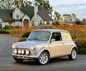 AUT 23 RK0668 02
1971 Austin Mini Cooper Silver 3/4 Front View On Pavement By House
