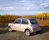 AUT 23 RK0672 02
1971 Austin Mini Cooper Silver 3/4 Rear View On Gravel By Vineyard