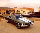 AUT 23 RK0725 10
1970 Chevy El Camino SS Green White Stripe 3/4 Front View By Water Fountain