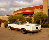 AUT 23 RK0732 04
1978 Chevy SS El Camino White And Gold 3/4 Rear View On Pavement By Trees And Building