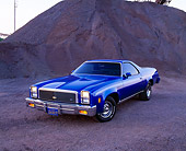 AUT 23 RK0737 01
1977 Chevy El Camino Blue Front 3/4 View By Pile Of Sand At Dusk