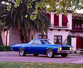 AUT 23 RK0742 02
1971 Chevy El Camino Blue Low 3/4 Side View By Spanish Building And Trees