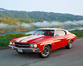 AUT 23 RK0748 07
1970 Chevy Chevelle SS 396 Red With White Stripe 3/4 Frotn View On Pavement By Grass Hill Filtered