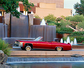 AUT 23 RK0777 02
1977 Cadillac Coupe Deville Convertible Red Side View On Water Fountains