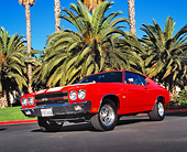 AUT 23 RK0876 02
1970 Chevrolet 454 Chevelle SS Hugger Orange White Stripes 3/4 Low Front View On Pavement By Palm Trees