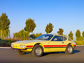 AUT 23 RK1069 01
1974 Volkswagen SP2 Ivory Low 3/4 Side View On Pavement By Trees