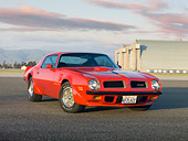 AUT 23 RK1825 01
1974 Pontiac Firebird Trans Am Red 3/4 Front View On Pavement
