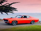 AUT 23 RK1848 01
1971 Ford Torino GT Orange 3/4 Front View On Pavement By Ocean