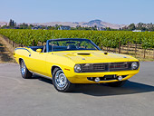 AUT 23 RK1853 01
1970 Plymouth Barracuda 383 Convertible Yellow 3/4 Front View On Pavement By Vineyard