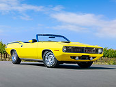 AUT 23 RK1857 01
1970 Plymouth Barracuda 383 Convertible Yellow 3/4 Front View On Pavement By Vineyard