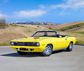 AUT 23 RK1859 01
1970 Plymouth Barracuda 383 Convertible Yellow 3/4 Front View On Pavement By Hills