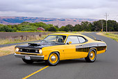 AUT 23 RK1874 01
1970 Plymouth Duster Yellow And Black 3/4 Front View On Road By Hills